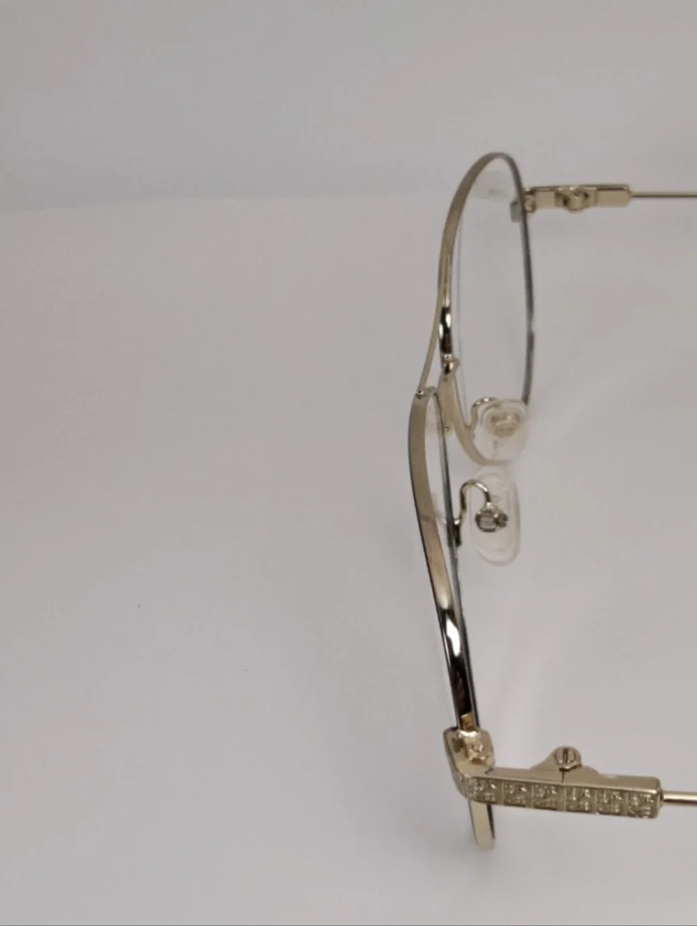 BCBGMAXAZRIA Call Aviator Eyeglass Frames in Black and Gold. Feminine.